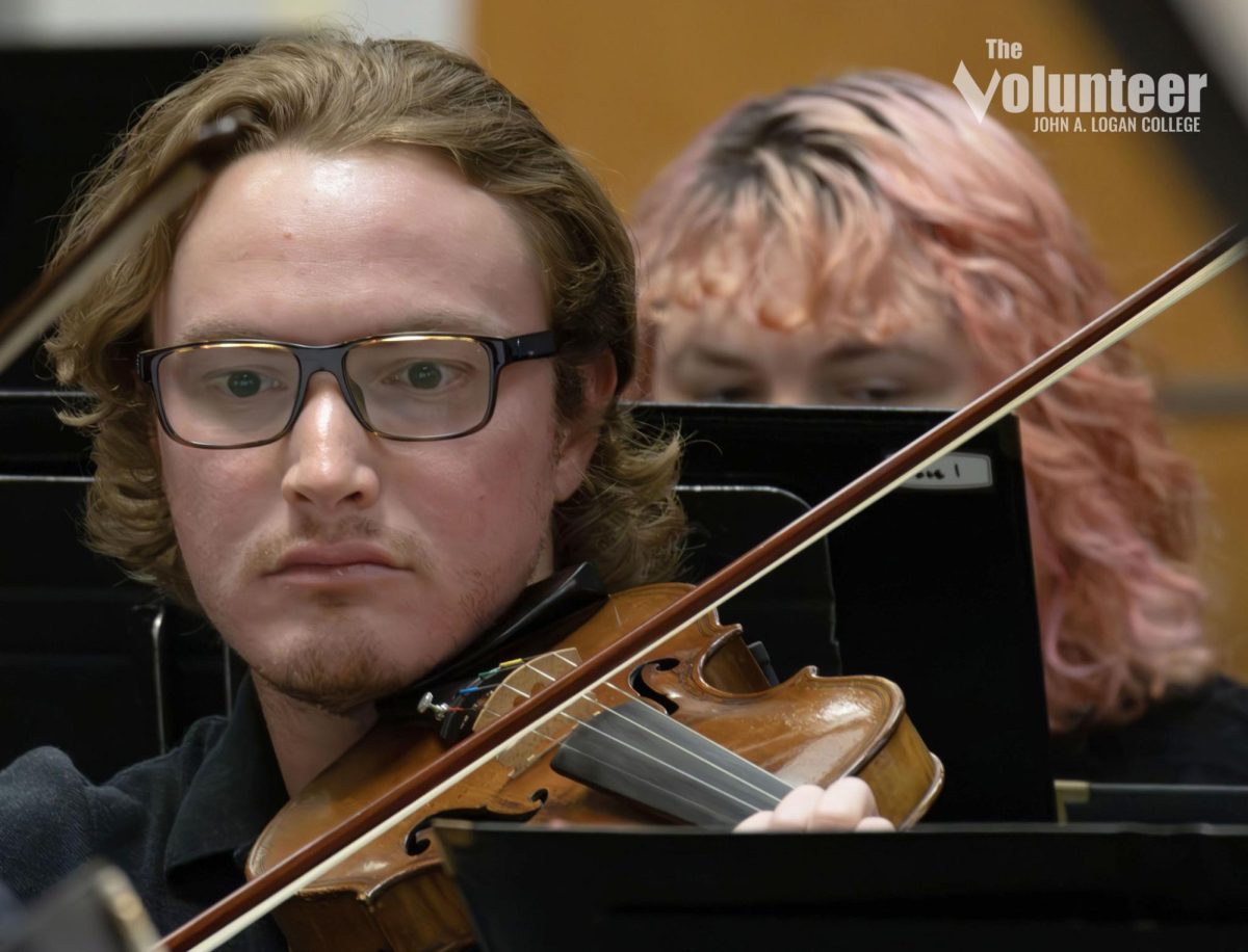 Alex Knudsen plays the violin during the John A. Logan College Spring Band and Orchestra Concert May 4.