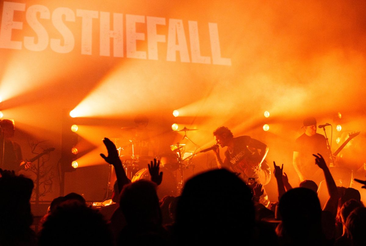 Blessthefall members guitarist Eric Lambert (far left), drummer Jared Frøn (left of center), vocalist Beau Bokan (right of center), and bassist and vocalist Jared Warth (far right) perform before a packed crowd Oct. 3, 2025, at Red Flag Concert Hall in St. Louis, Missouri.