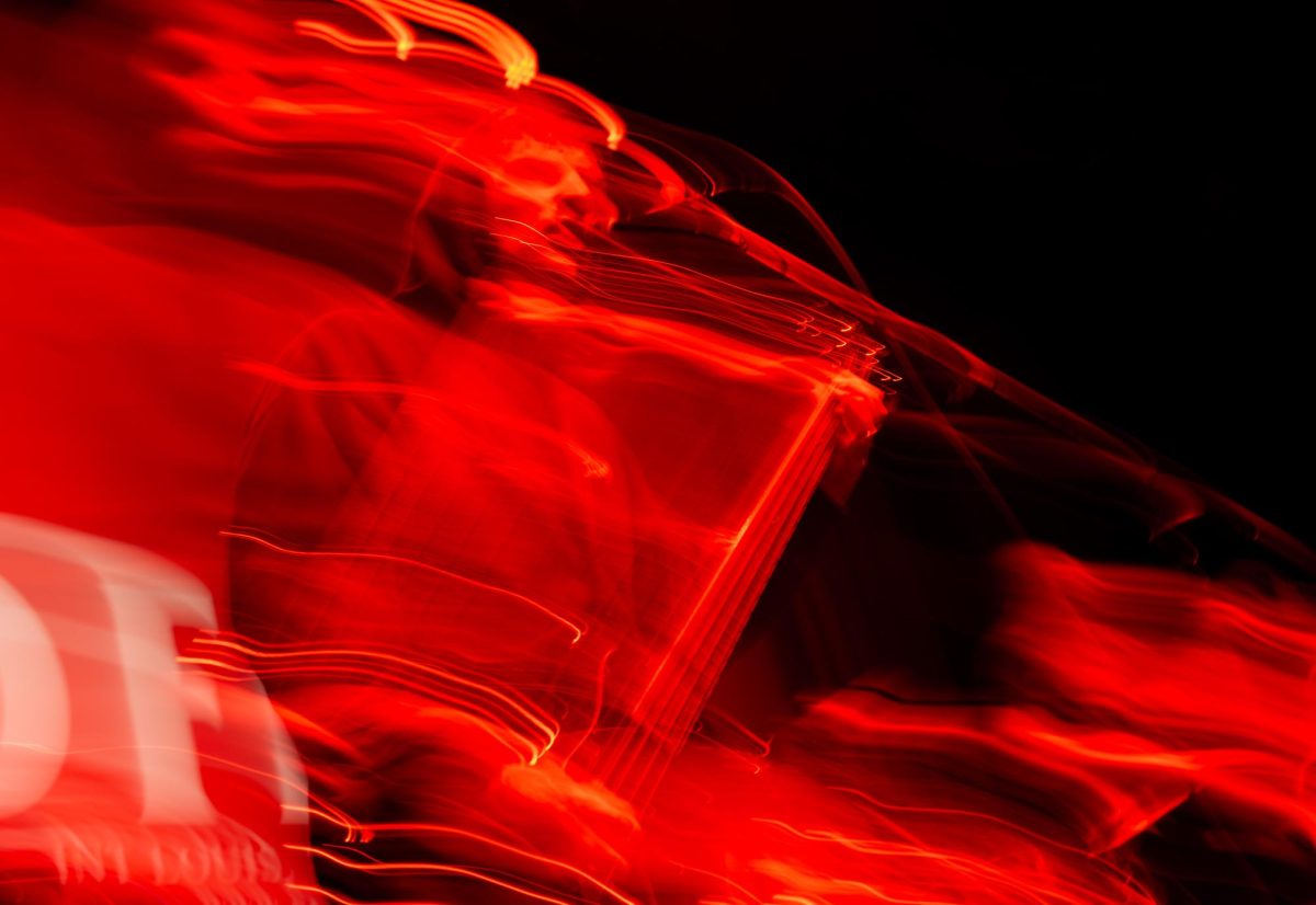 Abstract photo of frontman and bassist Martin Puppert of Sawed Off performing on stage at Red Flag Concert Hall, St. Louis, MO, Nov. 01, 2025.
