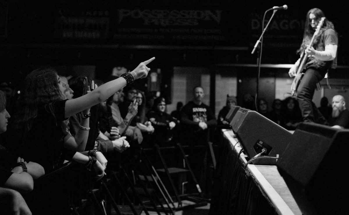 Concert goers excitedly point and yell to members of Bastardane at Red Flag Concert Hall in St. Louis, MO, Nov. 01, 2025.
