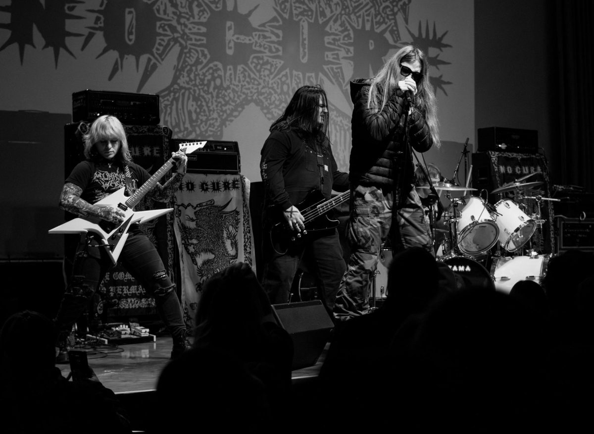 No Cure guitarist Aesop Mongo, left, bassist Jake Murnane, center left, frontman Blaythe Steuer, center right, and drummer Duncan Newey, right, play live on stage at Red Flag Concert Hall in St. Louis, Mo., on Nov. 1, 2025.