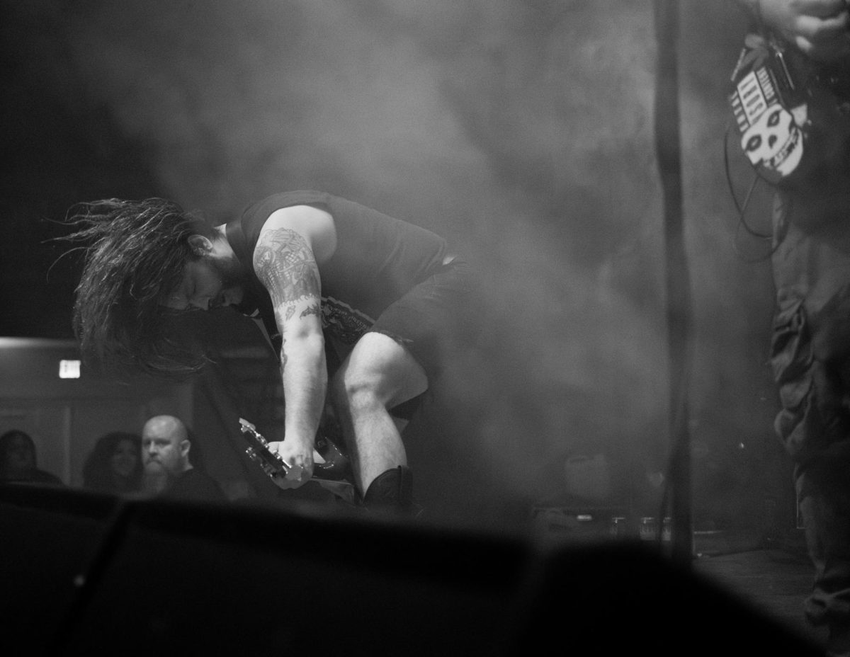 Bassist Todd Thompson of 200 Stab Wounds performs while headbanging at Red Flag in St. Louis, Mo., on Nov. 1, 2025.